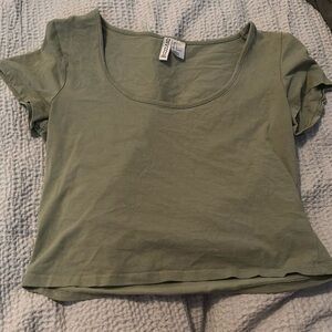 Large, sage green color, worn many time but well loved.